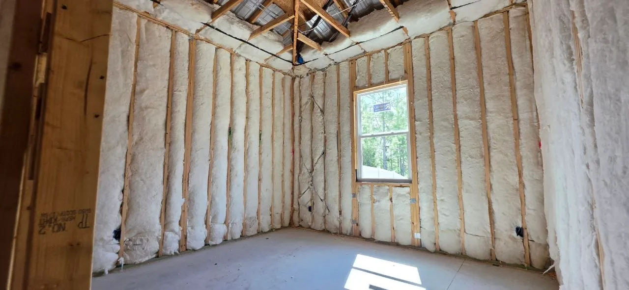 Walls and tray ceiling insulated with fiberglass